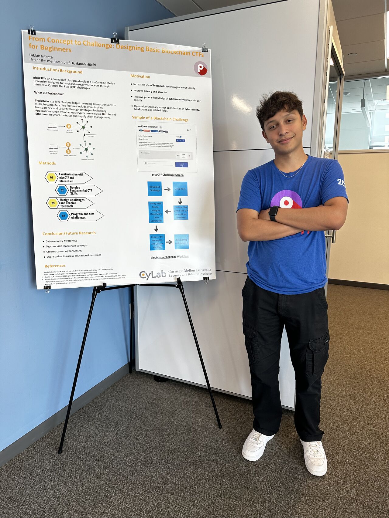 Fabian standing next to his picoCTF poster